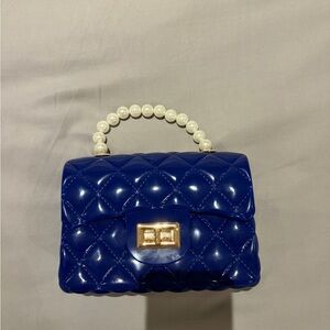 Elegant Blue Quilted Handbag with Pearl Handle